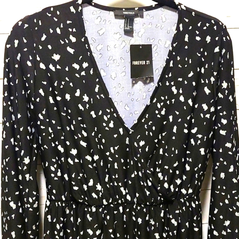 Long sleeve dotted above the knee dress